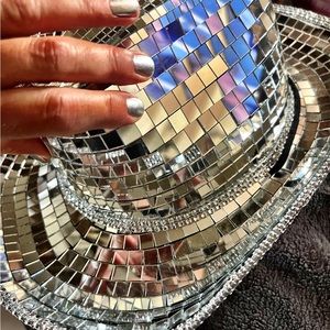 Be glam & sparkle wearing this disco cowgirl hat.